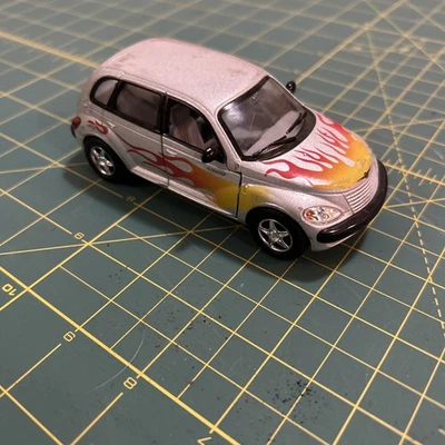 1:34 Chrysler PT Cruiser Silver with Flame Design - Diecast Model Car - Kinsmart - Image 1 of 4
