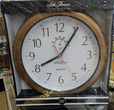 WEATHER RESISTANT CLOCK WITH THERMOMETER MADE BY SETH THOMAS CLOCK CO WC02070 - Image 1 of 2
