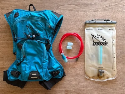 Mochila de hidratación USWE Airborne 3 azul 2 L vejiga con bolsillo para teléfono MTB carrera Foto 1 de 4