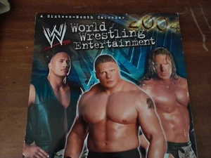 WWE/WWF 2004 calanader Rock, Brock Lesnar, Tiple H - Picture 1 of 2