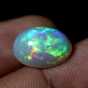 5,5 Karat Regenbogen Äthiopischer Opal, Welo Opal Cabochon, Opal, Multi-Feueropal - Bild 1 von 12