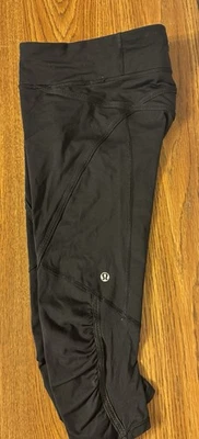 Lululemon Black Crop Legging Size 6 black Rear Pocket EUC  - Image 1 of 4