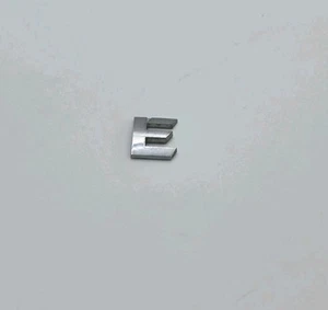 2001-2003 KIA SPECTRA LS REAR TRUNK EMBLEM LOGO BADGE SYMBOL LETTERS OEM - Picture 1 of 3