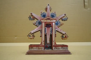 Juguete mecánico de hojalata carrusel 15 cm - Imagen 1 de 10