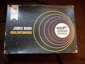 "GOLDFINGER" Puzzle James Bond 007 di Milton Bradley 1965  - Foto 1 di 3