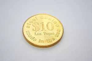 Steel Casino Las Vegas Made in USA Golden $10 Gambling Gaming Token AU / UNC - Bild 1 von 1