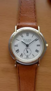 BULER NEW SWISS MADE WATCH - MATT GOLD & SILVER PLATED CASE - LEATHER BAND - Foto 1 di 4