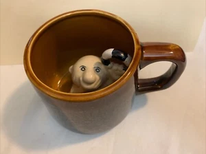 Vintage Brown Drip Glaze Speckled Pottery Mug Man Inside With Life Preserver - Picture 1 of 7