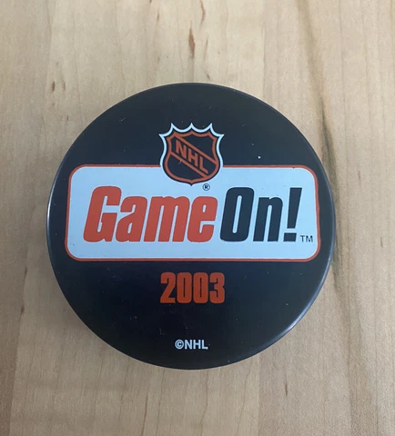 vintage NHL 2003 official game puck Game On Cover