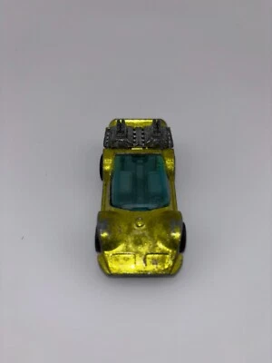 Hot Wheels Redline 1970 SIX SHOOTER amarillo, vidrio azul, interior gris - raro Foto 1 de 4