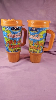 2 tazas coloridas Dollywood Splash Country Coca-Cola 2012 Fill & Chill Zone 32 OZ  Foto 1 de 4