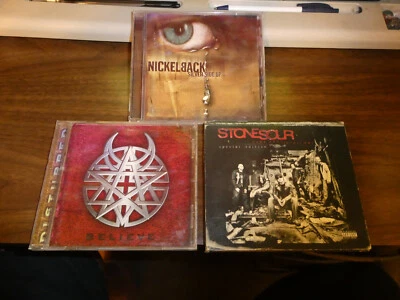 ROCK LOT 3 STONESOUR COME WHAT MAY NICKELBACK SILVER SIDE UP Disturbed Believe Foto 1 de 4