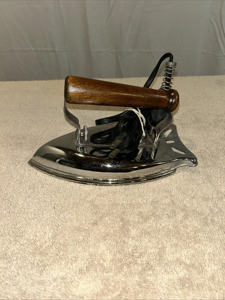 Plancha de viaje plegable Superstar con mango de madera Foto 1 de 4