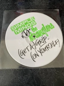 SIMPLE MINDS VS THE STRANGLERS - GET A GRIP - 7 ZOLL WEISSE VINYL-SINGLE - Bild 1 von 2