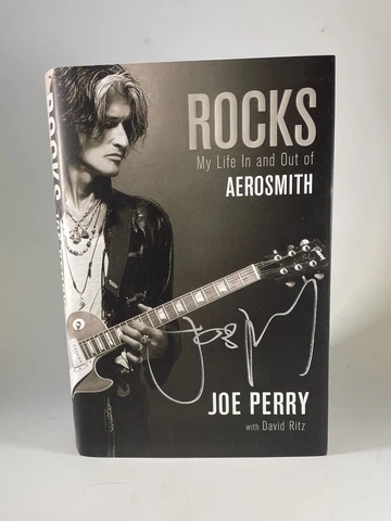 Aerosmith’s Joe Perry Signed Book ”Rocks” Auto with B&E Hologram Cover