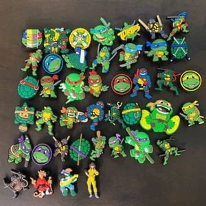Teenage Mutant Ninja Turtles Shoe Charms lot of 42 charms - Picture 1 of 6