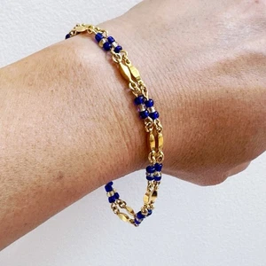 Bracciale con perline blu navy placcato oro 7" - Foto 1 di 9
