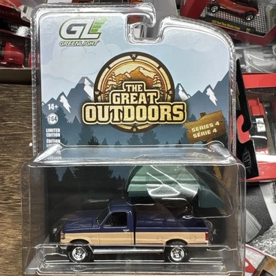 Ford F-150 XLT 1987 Greenlight azul con tienda de campaña diecast 1:64 excelente aire libre Foto 1 de 2