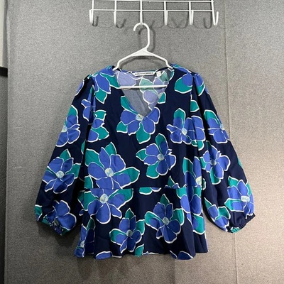 Top niña con curvas tejido crepé peplum azul marino floral talla pequeña Foto 1 de 4