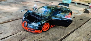 Bugatti Veyron Super Sport 2011 Carbón Black/Orange Minichamps escala 1/18 - Imagen 1 de 20