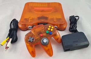 Nintendo 64 - Console - Fire/Sun Orange - Orange/Clear N64 Ricondizionata Ottima - Foto 1 di 7