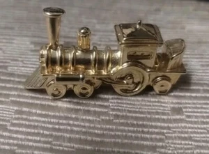 Miniatur / Puppenhaus goldfarbene Zugdekoration / Spielzeug - Bild 1 von 8