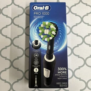 New Oral-B Pro 1000 Rechargeable Toothbrush Damaged box - Picture 1 of 4