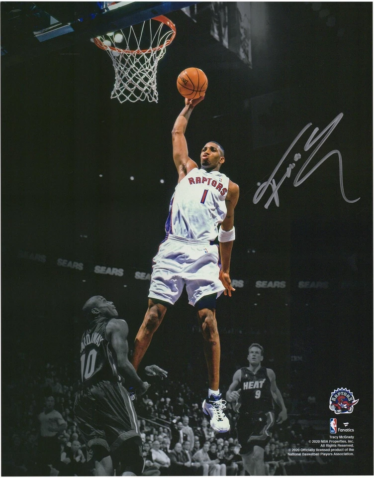 Foto firmada por Tracy McGrady Toronto Raptors 11x14 Spotlight Dunk vs Miami Heat Foto 1 de 1