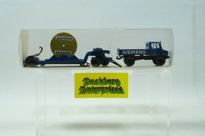Wiking 1:87 LKW 26502/1 Unimog 1700L mit Tieflader Siemens in OVP 172375 - Bild 1 von 2