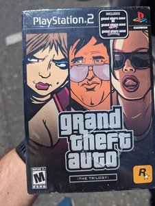Grand Theft Auto - Die Trilogie - werkseitig versiegelt - (PS2) 2006 Rockstar Games M17+ - Bild 1 von 4