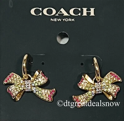 Pendientes Coach Pave Holiday Bow Huggies piedras de cristal de colores tono dorado CG078 Foto 1 de 4