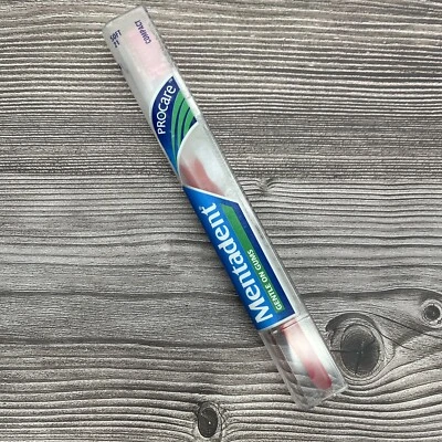 Cepillo de dientes Mentadent 21 ProCare suave compacto mango flexible cerdas laterales acampanadas Foto 1 de 4