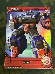 Transformers 2013 - Optimum Collection - G1 - Holo Foil - #TF18 - Patines - Imagen 1 de 2
