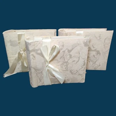 Set Of 3 - 4x6 Wedding Photo Albums - clothes covered w/ ribbon  - Image 1 of 4