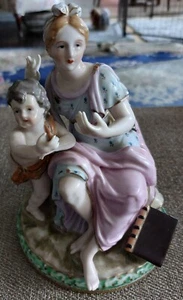 VINTAGE-ANTIQUE GERMAN PORCELAIN LADY & PUTTI WITH BOOK FIGURINE - Picture 1 of 12