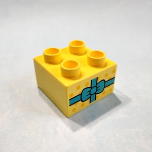 Lego Duplo Spezialgeschenk Geburtstagsgeschenk Band hellgelb Block Stein 2x2 C4 - Bild 1 von 1