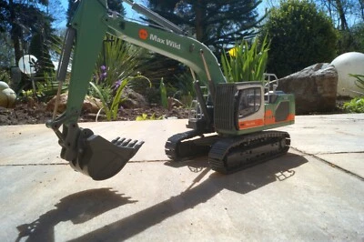 Conrad 2215-20  Liebherr R 938 V Hydraulikbagger "Max Wild"  Neu OVP  1:50 - Bild 1 von 4