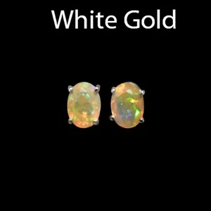 Ethiopian Opal Oval 7x5mm, 0.79 Carat Stud Earring In 14k White Gold (43463) - Picture 1 of 5