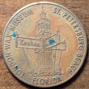 Ficha de recuerdo de buena suerte de latón Museo de cera de Londres de la playa de San Petersburgo Florida FL - Imagen 1 de 4