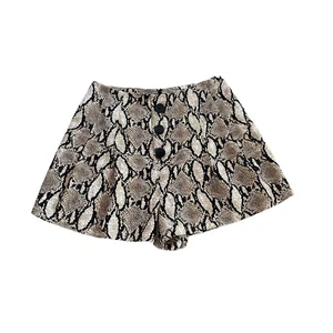 vestique mujer pitón pantalones cortos anchos cuadros crema marrón talla mediana botón delantero - Imagen 1 de 11