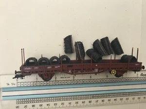 ho train Roco made in Austria dark brown flat car with black wire bundles - Picture 1 of 6