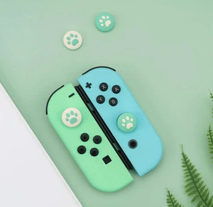 Brandneu Pfotenabdruck Hund Katze Daumen Abdeckungen Schutzfolien für Nintendo Switch - Bild 1 von 3