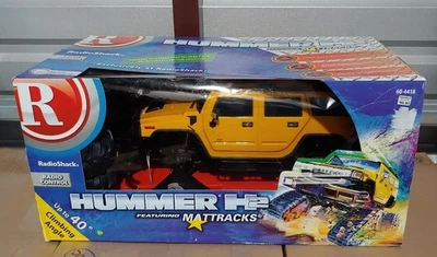 RadioShack Hummer H2 带 Mattracks 1: 10 比例无线电控制 (60-4418) 全新带盒 — 第 1/4 张图片