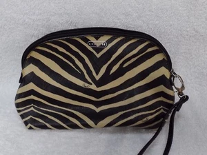 Bolso tipo muñeca Coach negro tostado cebra maquillaje cosmético multifunción - Imagen 1 de 12
