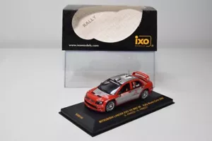 B24 1:43 IXO RAM146 MITSUBISHI LANCE EVO VIII WRC #9 RALLY MONTE CARLO 2004 MIB - Foto 1 di 19