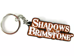 SHADOWS OF BRIMSTONE KEYCHAIN Flying Frog Productions NEW!! - Picture 1 of 2