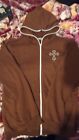 Brown Orange Hoodie With A Cross On The Back