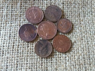 SMALL COLLECTION-LOT OF 7 MIXED BRONZE VINTAGE WORLD COINS  - Image 1 of 4