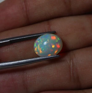 Cabine ovali opale etiope fuoco appariscente arcobaleno AAA naturale 4,3 ct 13,2 x 11,2 mm - Foto 1 di 14