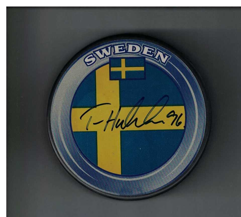 Tomas Holmstrom AUTOGRAPHED SWEDEN HOCKEY PUCK SIGNED COA DETROIT RED WINGS - Image 1 of 1